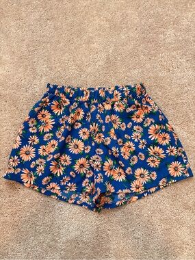 Tyche High-Waist Floral Shorts in Navy with Orange Daisy Print